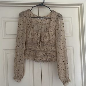 Black and cream long sleeve top size medium